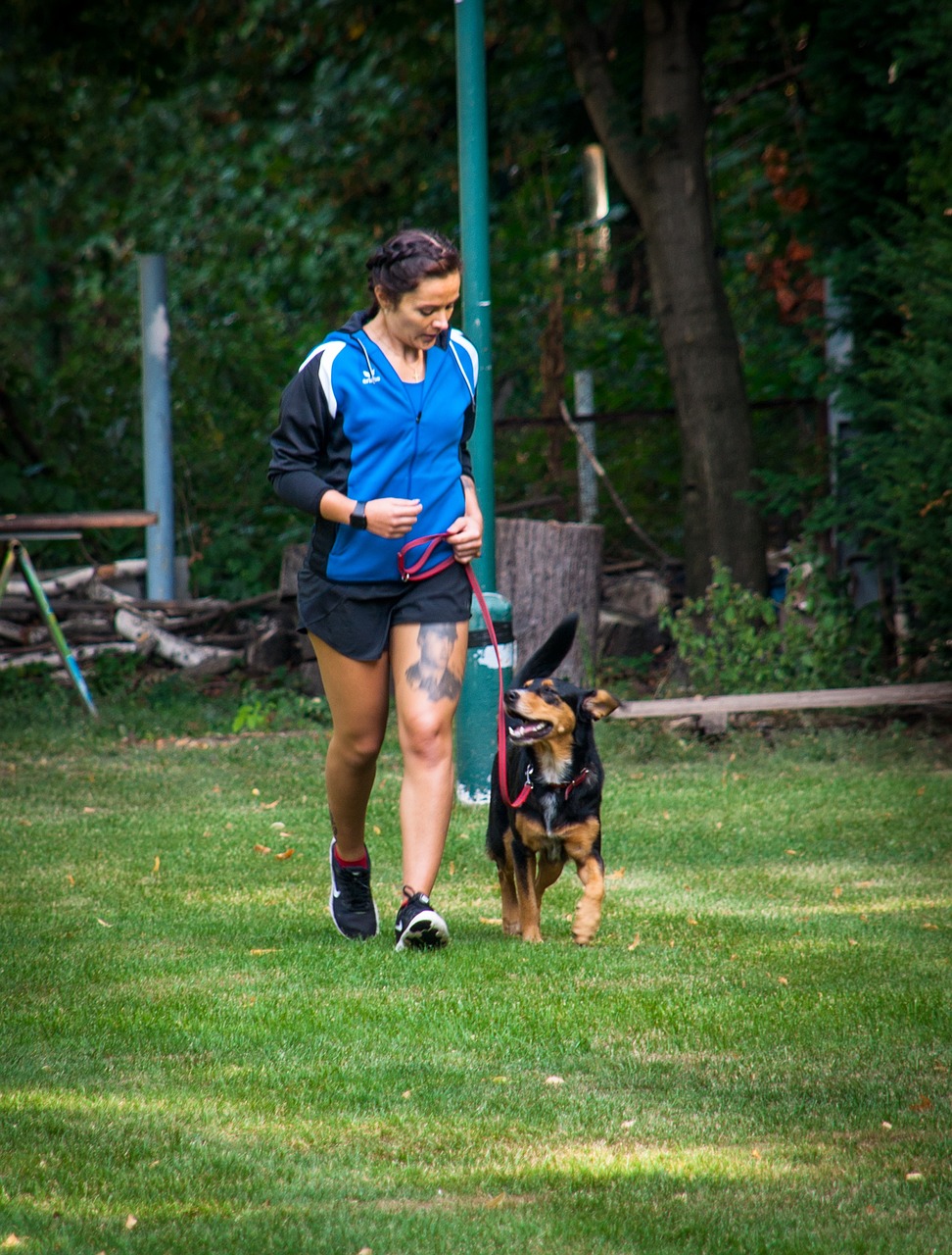 Girl with Dog on leash in Potts Dog Sanctuary